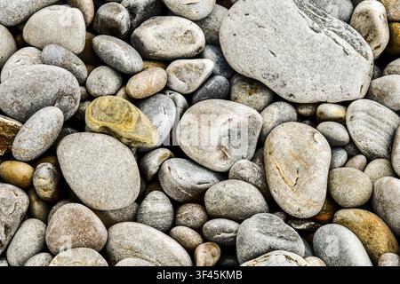 Pebbles on the beach, photo as a background, digital image Stock Photo