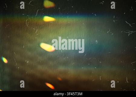 Vintage film texture displaying light leak, grain and dust for retro effect Stock Photo
