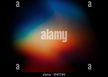 Abstract background showing blend of vibrant colors with grainy texture and light leaks Stock Photo