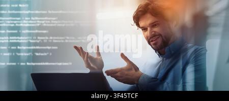 Focused Caucasian Male Developer Programming At Laptop In Modern Office, Business Concept Stock Photo