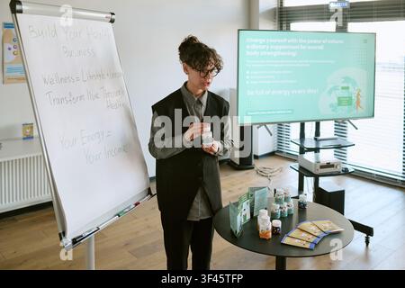 Young Adult Woman Presenting Supplement Business Training Seminar Stock Photo