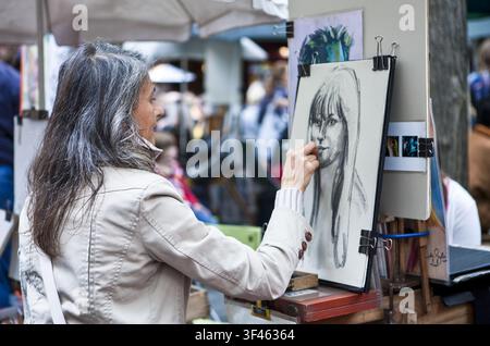 France, Paris, Montmartre, painters in Place du Tertre Stock Photo