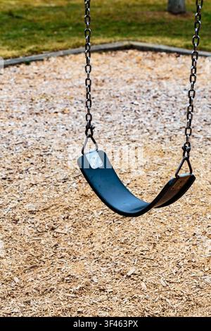Childrens swings in play area, Manito Park, Spokane Stock Photo
