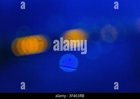 Blurred headlights and tail lights at night. Stock Photo