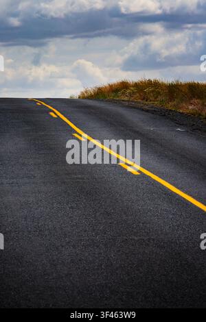 A road in the country with a passing lane. Stock Photo