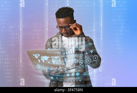 Black man using laptop, cyber security concept Stock Photo