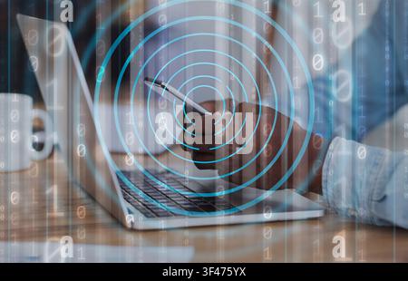 Mobile Security Concept. Black man using phone and laptop Stock Photo