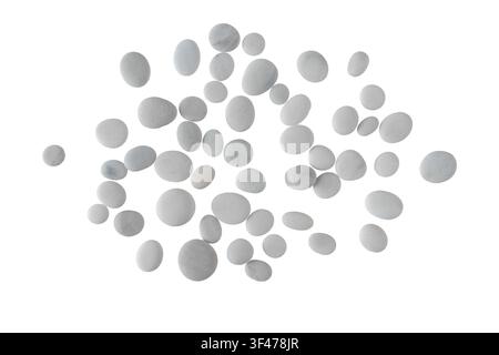 Assorted smooth white pebbles arranged on a white background. Minimal natural stone collection ideal for beach, spa, zen, wellness, decoration and des Stock Photo