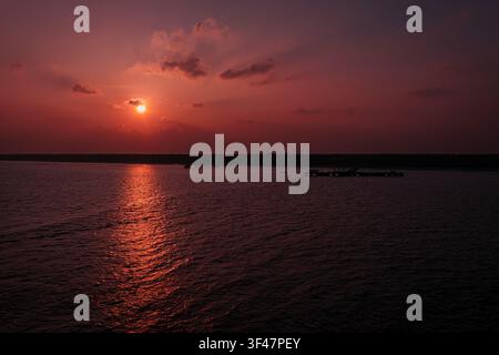 Dramatic red and orange sunset over the sea, Agatti Island, Lakshadweep, India Stock Photo
