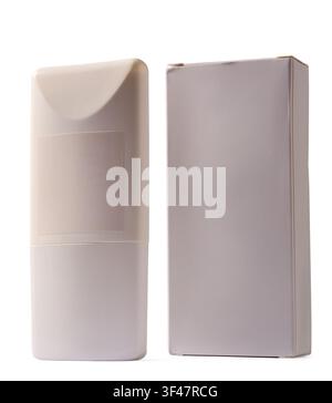 blank sunscreen bottle and cardboard box isolated white background, unbranded plastic cosmetic container and paper packaging mock-up template Stock Photo