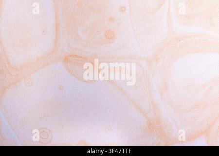 Minimal abstract watercolor background in soft beige, cream, and ivory tones with gentle translucent washes and subtle circular details. Elegant neutr Stock Photo