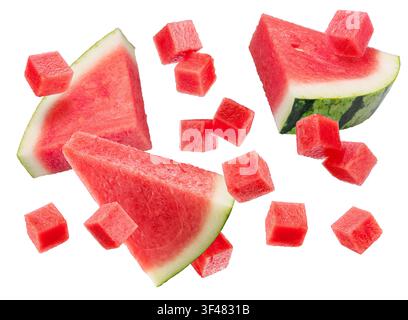 Watermelon triangles and watermelon cubes levitating in air on it isolated on white background. File contains clipping paths. Stock Photo