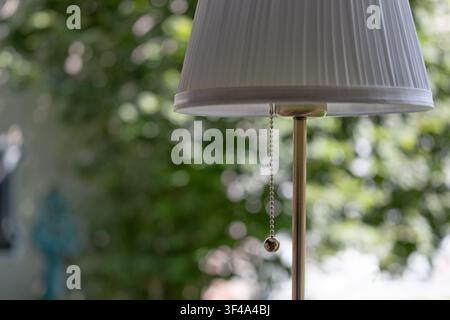 Modern table lamp with soft natural background in cozy home interior Stock Photo