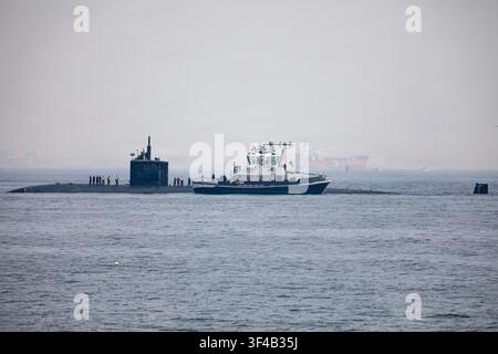 The Los Angeles-class fast-attack submarine USS Scranton (SSN 756), homeported at Naval Base Point Loma in San Diego, California, transits Tokyo Bay on July 17, 2026, while conducting routine operations in the U.S. 7th Fleet area of operations. Stock Photo