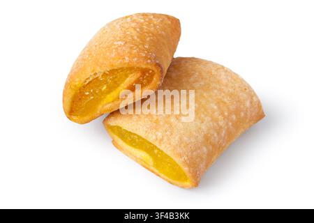Cookies filled with yellow jam on a white background. Two filling cookies close-up. Stock Photo