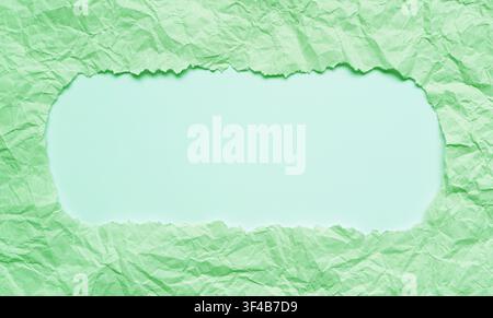 Frame of Ripped Mint Green Paper with Copy Space Stock Photo