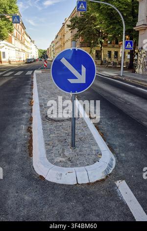 Directional arrow, road marking, road traffic, traffic island, Leipzig, Saxony, Germany Stock Photo