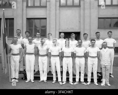 A photograph commissioned by Nils Lindberg, a Swedish elementary school teacher, who is seated in the first row, far right. Stock Photo
