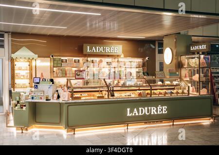 Paris, France - January 28, 2026: Ladurée boutique selling macarons, pastries, chocolates and gourmet gifts inside Paris Orly Airport Terminal 4. Stock Photo
