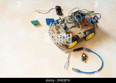 DIY Robot Car components. Educational electronics project for STEM learning and robotics project. Stock Photo
