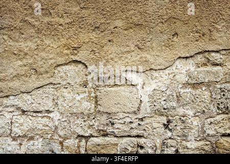 Close-up of a plastered stone wall Stock Photo