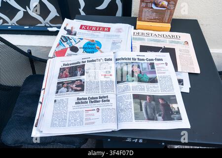 German Newspapers with Kurier and Der Standard Spread on the Table for Reading Daily News Articles. Vienna, Austria - June 21, 2026 Stock Photo