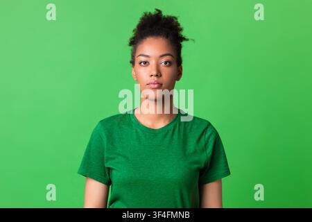 Close up portrait of serious afro lady looking at camera Stock Photo