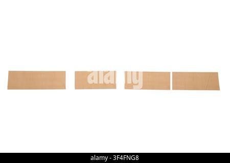 Four pieces of brown kraft paper tape with rough edges, isolated on a clean white background for packaging and crafting, the adhesive strips are isola Stock Photo