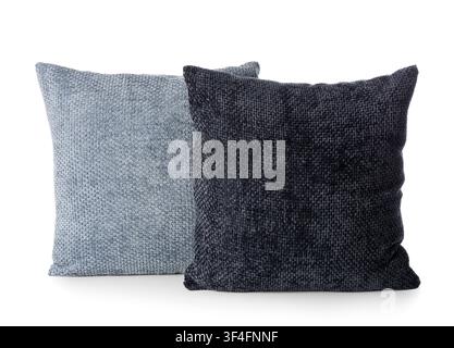 Two textured decorative throw pillows in light blue and dark gray for home decor and comfort, isolated on a white background Stock Photo