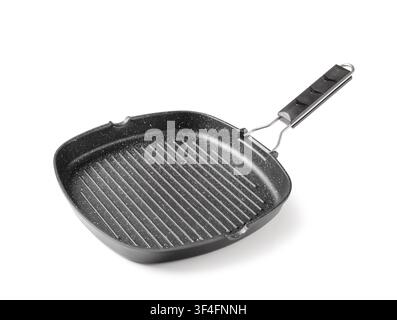 Empty black square grill pan with a non-stick surface and ribbed bottom kitchenware for cooking isolated on white background Stock Photo