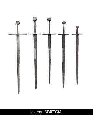 Group of old medieval swords isolated on white with clipping path Stock Photo