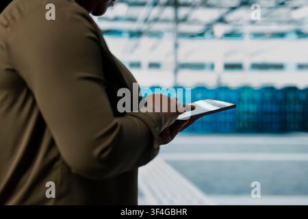 Close up of data center system administrator installing and configuring hardware used for hosting digital services. Server room worker testing and repairing rigs managing file transfers Stock Photo