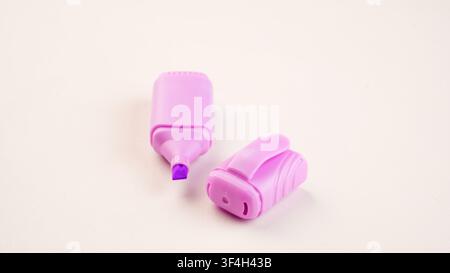 Purple Highlighter Pen on White Background Stock Photo