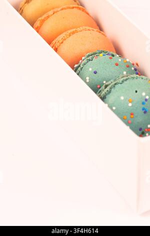 Close-Up of Colorful Macarons in Gift Box Stock Photo