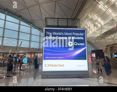 Qwen open-source AI models developed by Alibaba Cloud digital billboard ranks the model as number one globally, Hong Kong airport Stock Photo