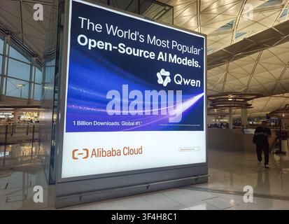 Qwen open-source AI models developed by Alibaba Cloud digital billboard ranks the model as number one globally, Hong Kong airport Stock Photo