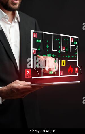 Understanding emergency evacuation plan on a digital device Stock Photo