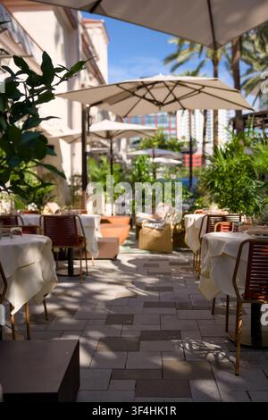 Outdoor Restaurant Courtyard With Umbrellas And Tables Stock Photo