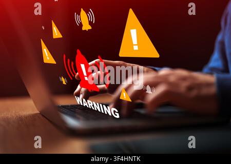 Emergency 911 alert displayed on a computer screen during urgent situation showing warning signs and notifications Stock Photo