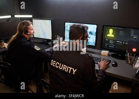 Security Team Monitoring Surveillance Data Stock Photo