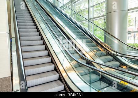 Empty escalators in modern building Stock Photo
