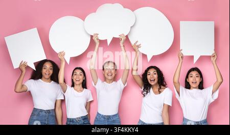 Cheerful Ladies Holding Speech Bubbles Posing On Pink Background, Panorama Stock Photo