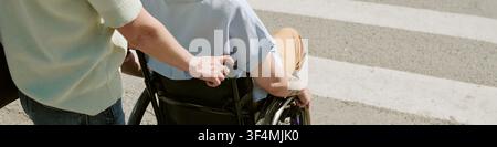 Header of Woman with Disability Using Wheelchair Outdoors Stock Photo