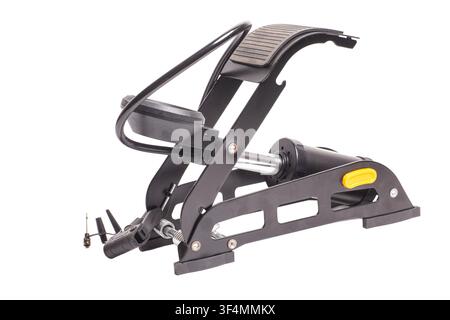 foot operated car pump with a pressure gauge isolated on white background Stock Photo