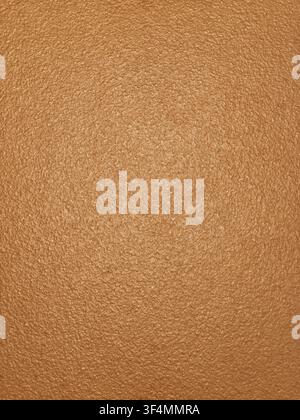 Full frame macro background of a textured bronze metallic painted surface with shimmering gold glitter particles under soft light. Stock Photo