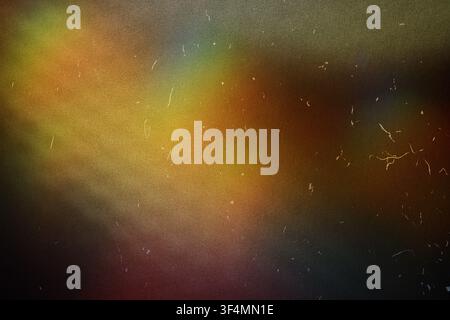 Abstract background showing colorful gradients, light leaks, film grain and vintage texture Stock Photo