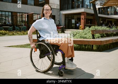 Portrait of Young Woman with Disability Outdoors in Urban Workplace Stock Photo