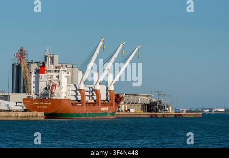 Southampton Doxks southern England UK. 26.07.2026. A massive cargo vessel is moored at a port facility, in Southampton its deck laden with components Stock Photo