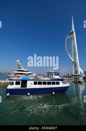Ali Cat, Solent cruises harbour tour boat sails into Portsmouth Harbour on a sunny calm day. Stock Photo