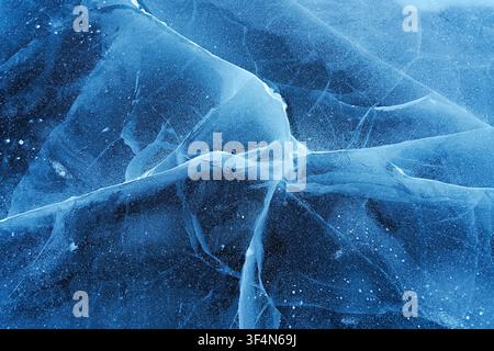The ice that covers Dream Lake forms beautiful designs with bubbles, cracks, and fissures covering the surface and just below. The lake freezes in Oct Stock Photo